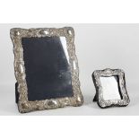 A Victorian style Sheffield hallmarked silver photograph frame, having embossed foliate