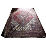 A North West Persian rug, with geometric central design, 300 x 203cm