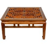 A CHINESE LOW TABLE WITH LATTICEWORK TOP. Early 20th Century. Of square section, resting on short