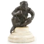 A JAPANESE BRONZE MODEL OF A SEATED MONKEY.  Late Meiji, 19th Century. The right knee raised