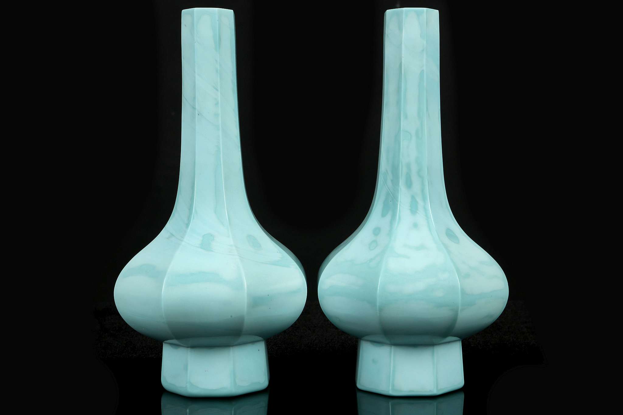 A PAIR OF LIME GREEN PEKING GLASS FACETTED BOTTLE VASES.  Qing Dynasty, 18th / 19th Century.  Of