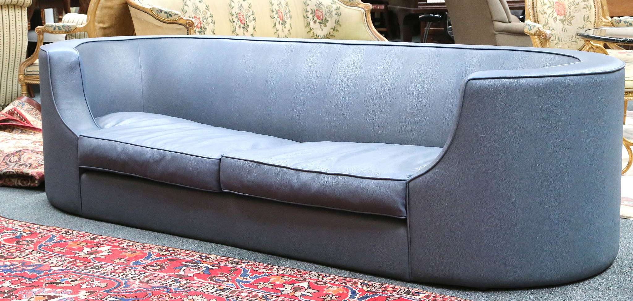 A Heals blue leather upholstered sofa with C end arm rests, 147cm w x 100cm d x 67cm h