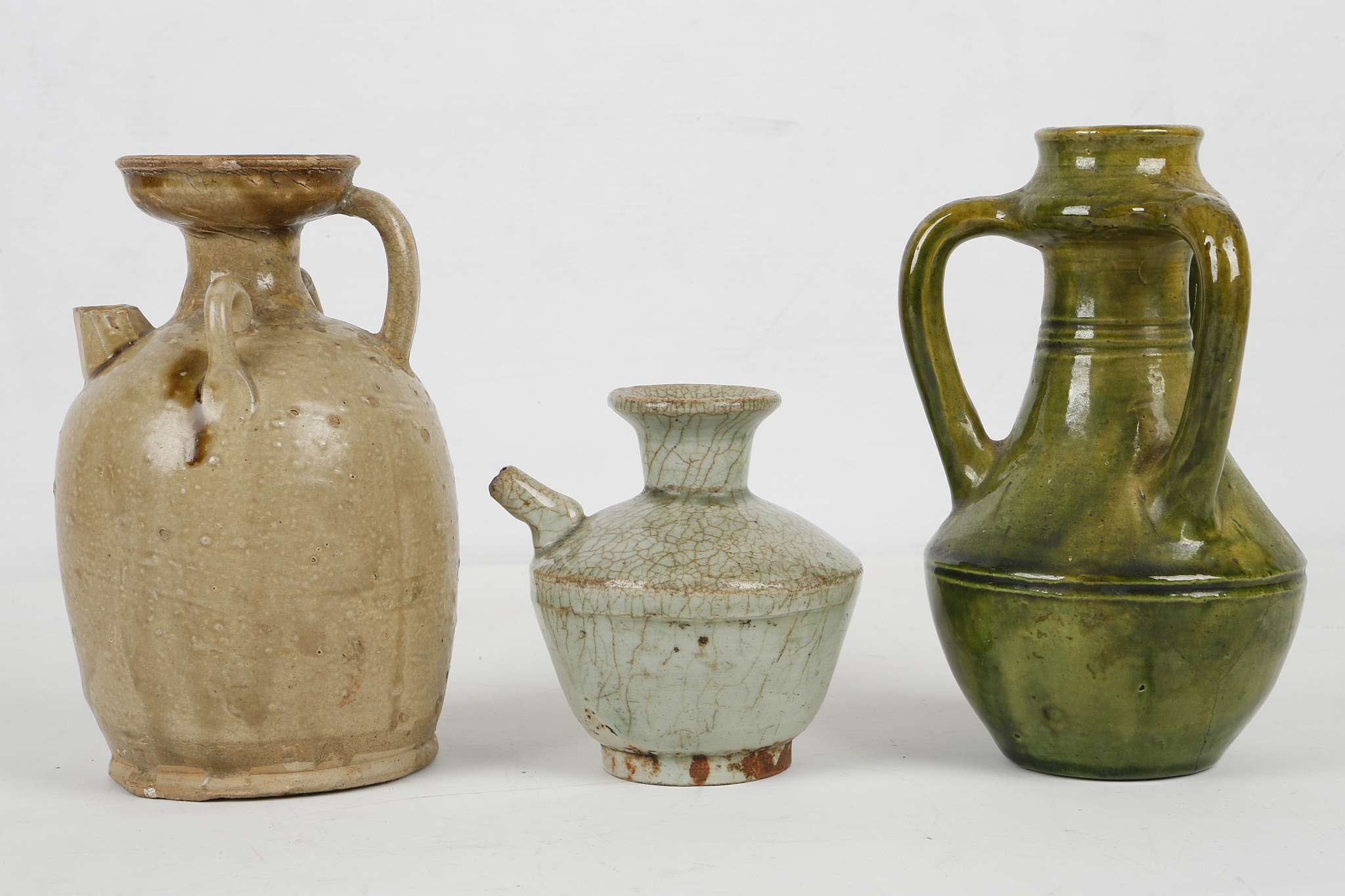 THREE CHINESE GLAZED STONEWARE CERAMICS. Tang Dynasty or later. Comprising an olive green glazed - Image 3 of 7