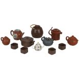 A COLLECTION OF MAINLY YIXING TEAPOTS.  19th Centu