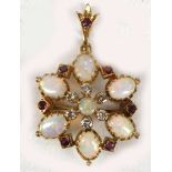 An antique opal, diamond and ruby pendant set in high carat gold