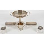 A small quantity of hallmarked silver items to include a twin handled footed dish, a small trophy