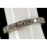 A vintage white metal and diamond full eternity ring