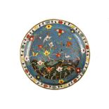 A CHINESE CLOISONNNÉ ENAMEL DISH. Ming Dynasty, Wanli, early 16th Century. The interior with central