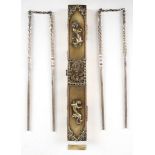 A pair of 19th century Chinese export chopsticks in an original gilded metal box, applied with two