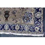 A Persian rug, grey ground, blue running border