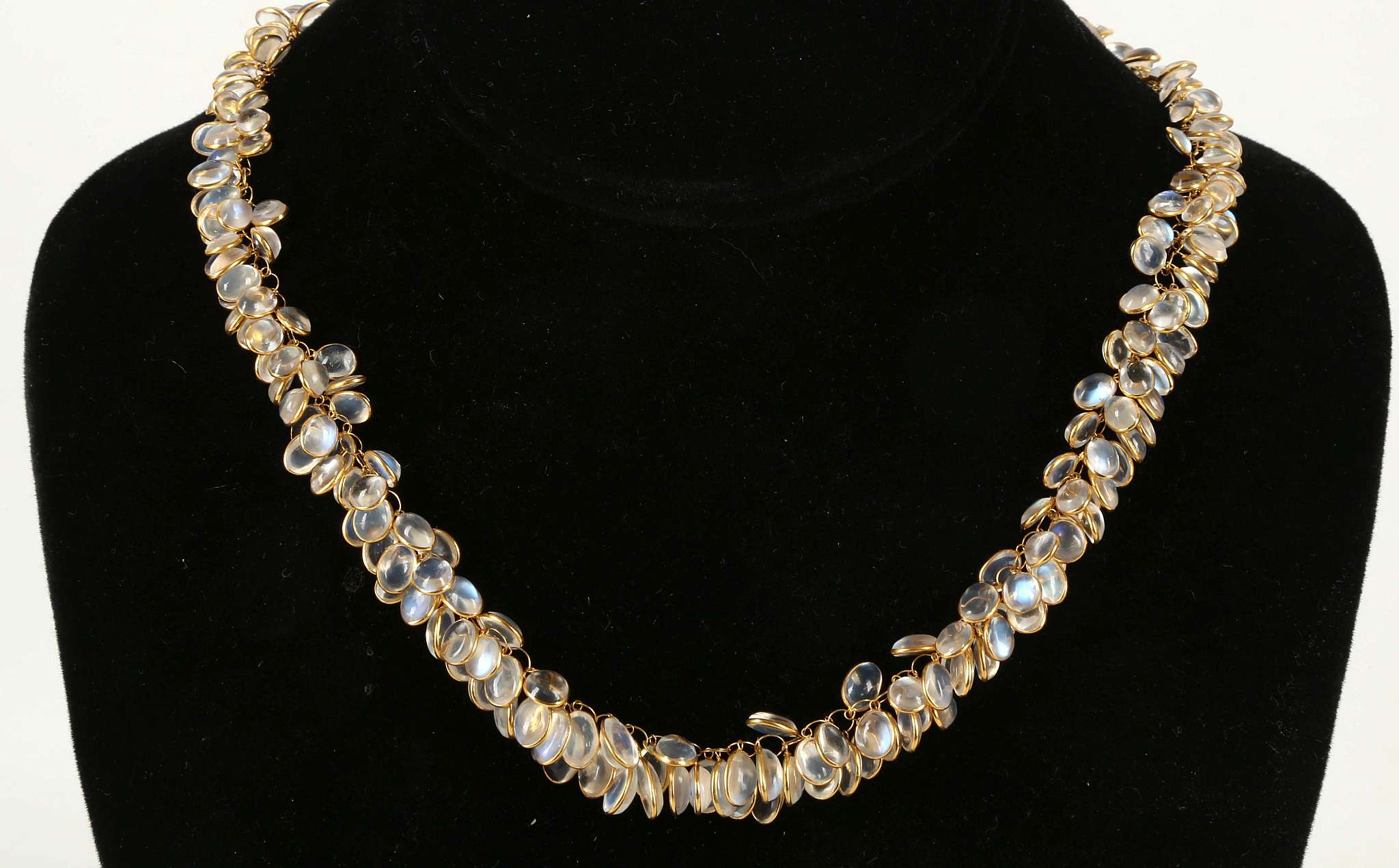 A 14k gold and moonstone cluster necklace