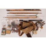 A collection of vintage fishing tackle comprising a split cane boat rod, three brass and wood 'rib
