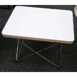 An Eames inspired chrome metal and laminated wood lamp table, 24 x 39 x 4cm