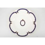 A Victorian Minton's circular dinner plate, made for Buckingham Palace and marked verso with