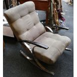 A Danish style 1960's polished steel rocking chair, mink colour, buttoned suede back and seat