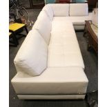 A Roche Bobois ivory leather upholstered corner suite of seating furniture, raised on chrome metal