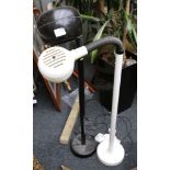 A pair of 1970's floor lamps, in black and white ABS, 145cm high max