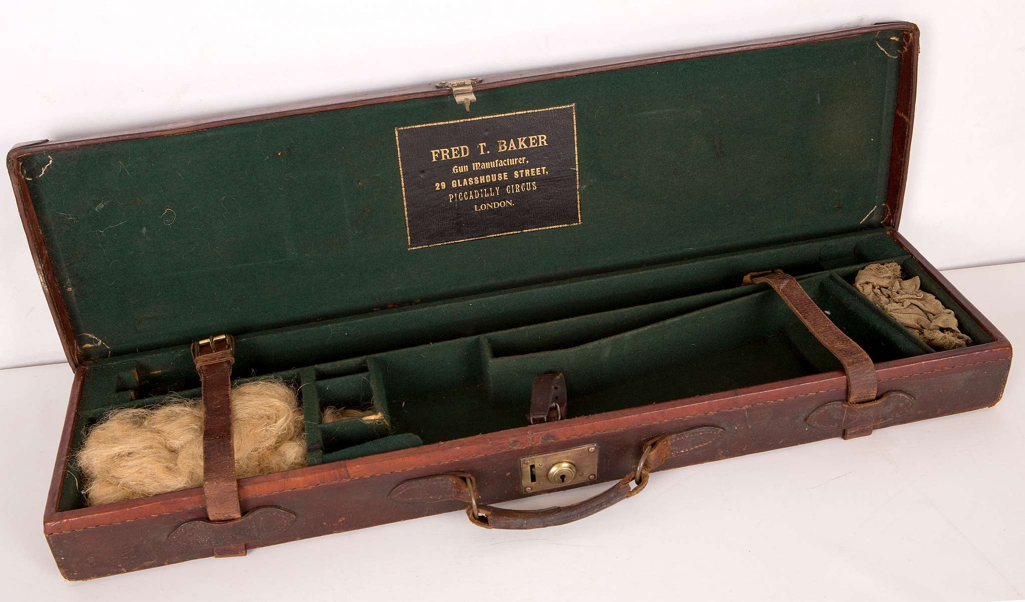 An early 20th century shotgun carry case by Fred Baker of Glasshouse Street, Piccadilly Circus,