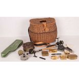 A wicker work angler's creel and contents comprising; a Shakespeare 'Flu Jet Set 1994', telescopic