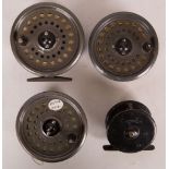 An Intrepid 'Rimfly' king size reel (with two spare spools) and a vintage A.W. Gamage anodised metal