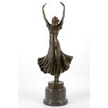 A bronzed figure of a lady adopting ballets 'Fifth Position', inscribed 'D.H. Chiparus', on a