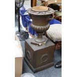 A painted terracotta company form, garden urn on a