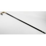 A Victorian ebony, horn and hallmarked silver walking cane, the horn handle having engine engraved