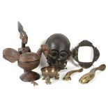 A 19th Century Congo tribal mask, together with a Nigerian figure group with chicken, an Indian