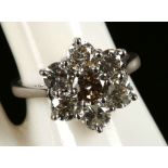 An 18ct white gold and diamond cluster ring, diamond: 2.42ct