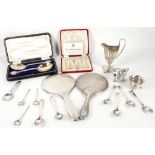 A cased pair of hallmarked silver sterling spoons, having gilded interior, Sheffield 1923, a pair of