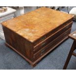 An Amboina wood five drawer map chest with 'military handles' on bracket feet, provenance: