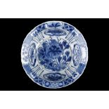 A CHINESE KRAAK BLUE AND WHITE KLAPMUTS BOWL. Ming Dynasty, Wanli. The central roundel decorated