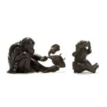 TWO JAPANESE BRONZE MONKEY OKIMONO. Meiji Period. One wearing a jacket and holding a leafy branch in