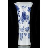 A CHINESE TRANSITIONAL BLUE AND WHITE VASE, GU. Transitional Period, c. 1690  With a flaring rim,