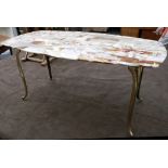 A mid 20th Century brass based coffee table, having onyx top