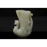 A CHINESE JADE RHYTON WITH PHOENIX BASE.Qing Dynas