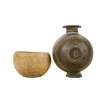 A STONEWARE BOWL AND A BLACK POTTERY COCOON FLASK. Eastern Zhou and Western Han respectively. 5.