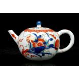 A CHINESE IMARI TEAPOT AND COVER. Qing Dynasty, 18th Century. Of squat globular form, decorated with