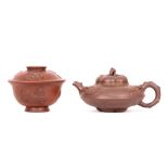 A CHINESE YIXING TEAPOT AND COVER TOGETHER WITH A TEABOWL AND COVER. Early 20th Century. The