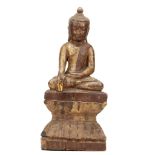 A BURMESE LACQUERED WOOD SEATED BUDDHA. Raised on a double lotus plinth, 49cm H.  缅甸 佛陀木雕坐像