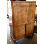 A 19th Century walnut and line inlaid, abattant escritoire with frieze drawer over a fall front,