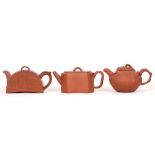 THREE CHINESE YIXING TEAPOTS AND COVERS. 19th – 20th Century. Comprising a quatralobed teapot with