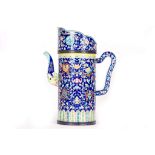 A CANTON ENAMEL DECORATED MONKS HAT EWER AND COVER, DUOMUHU. Qing Dynasty, 18th / 19th Century. Of