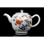 A CHINESE IMARI TEAPOT AND COVER. Qing, 18th Century. Of globular form, with drooping spout,