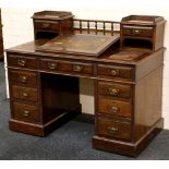 An Edwardian mahogany twin pedestal desk (originally purchased from Maples in 1913), having a