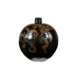 A CIZHOU RUSSET DECORATED BLACK GLAZED JAR. Song Dynasty. The globular body decorated with two