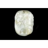 A CHINESE JADE PEBBLE PENDANT CARVED IN RELIEF WITH TWO MONKEYS. Late Qing. The surface carved in