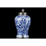 A SILVER MOUNTED KANGXI BLUE AND WHITE VASE. Kangxi. Of ovoid potiche form with a convex spreading