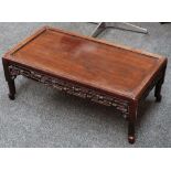 A Chinese tea table, hongmu, early 20th Century, cloud pattern carving to apron, stub shaped legs,
