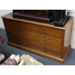 A faux marbled topped mahogany plan-type chest, with converted top cutlery drawer